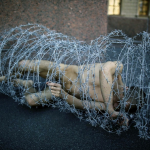 Russian Artist Wrapped In Barbed Wire - Art Shot