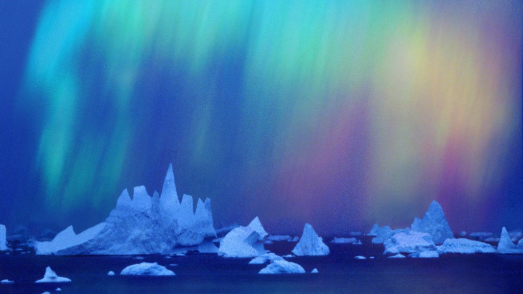 Aurora australis (Southern Light) over icebergs