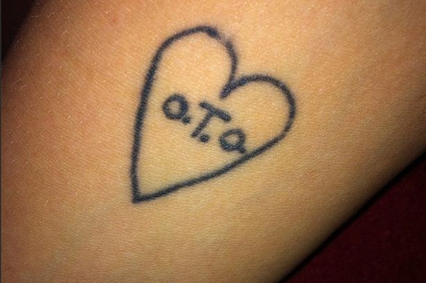 Peaches Geldof Illuminati - OTO tattoo
