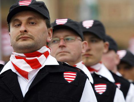 Members of the Jobbik "Hungarian Guard" participate in an inauguration ceremony in Budapest's Heroes Square