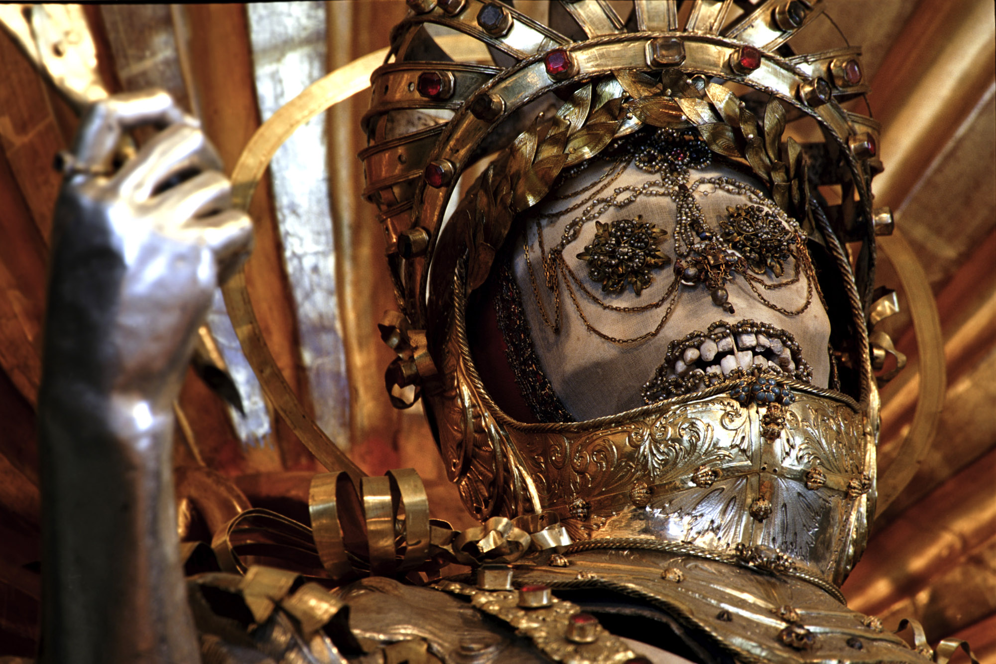 - Bürglen, Switzerland, detail of the skull St. Maximus inside armored helmet. One of two surviving skeletons of saints taken from the Roman Catacombs as presumed martyrs and decorated in armor in Switz -